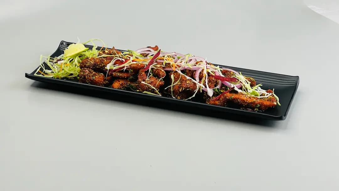 Charcoal mandi pots finishing over coconut husk.